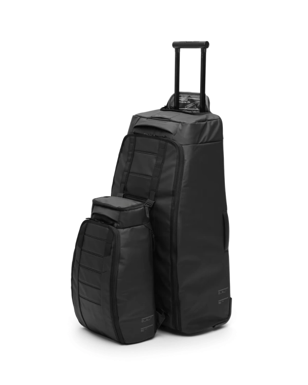 Torba podróżna na kółkach DB Hugger Roller 90L 3.png.webp