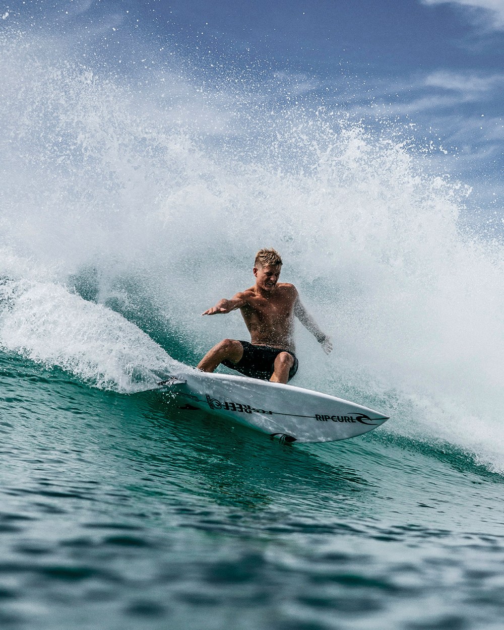 FCS C3 Classic Grip - surfer w akcji